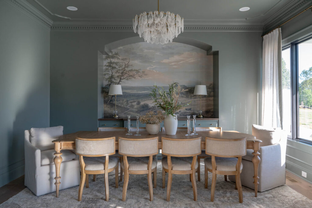 Huyck House dining room in a color drenched style with the walls, ceiling and trim painted the same color.
